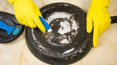 Any Grime Will Come Off: How to Quickly Clean Years of Baked-On Grease from Your Pan
